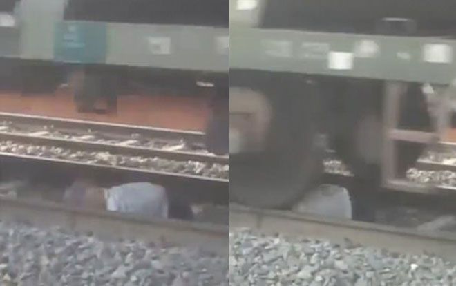 Say rượu ngã trên đường ray, người đàn ông sống sót thần kỳ khi tàu hỏa chạy qua