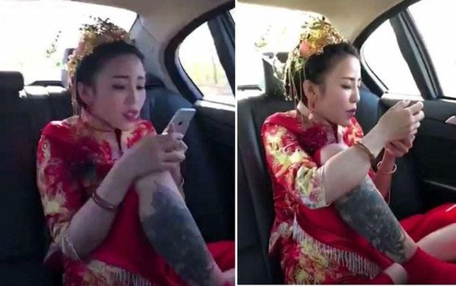 Cô dâu xăm trổ ngồi 'duyên hết nấc', biểu cảm của chú rể còn đáng chú ý hơn