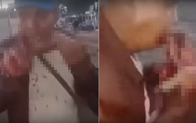 Người đàn ông gây phẫn nộ vì thản nhiên ăn thịt mèo sống giữa đám đông