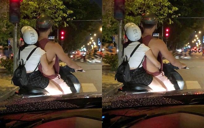 'Bàn tay hư hỏng' của cô gái qua chiếc áo khoét sâu của chàng trai trên phố khiến nhiều người khó chịu