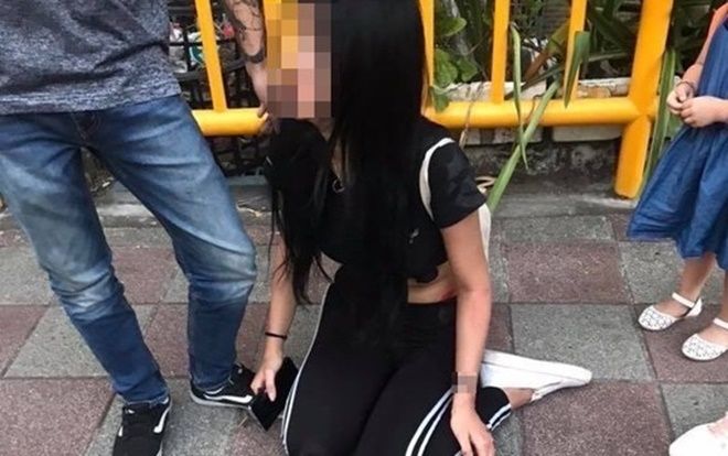 Cô gái nằm sõng soài bất động bên đường sau hành động tàn nhẫn của người chồng