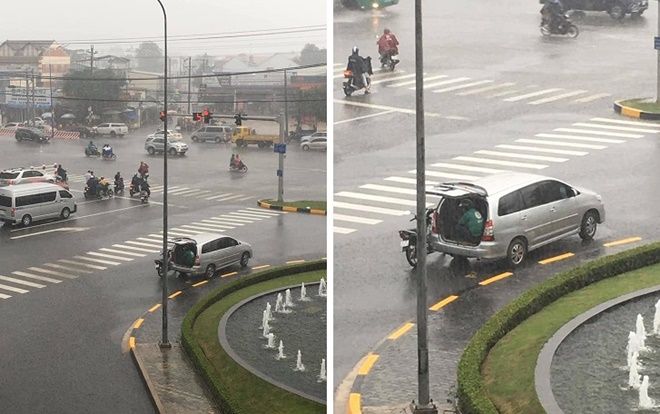 Ấm lòng hình ảnh tài xế ô tô mở luôn cốp sau cho anh Grab Bike trú nhờ giữa lúc trời mưa gió