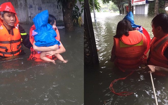 Cảnh sát bơi trong biển nước, giải cứu mẹ cùng cháu bé 18 tháng tuổi kẹt trong nhà