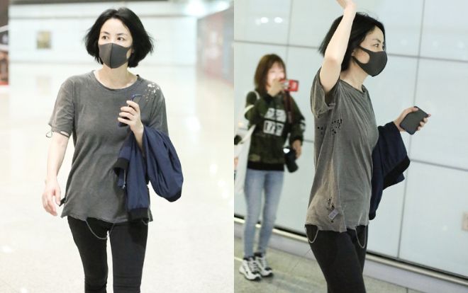 Bị đồn chia tay Tạ Đình Phong, Vương Phi ăn gian tuổi với áo phông rách lòi cả tag tại sân bay