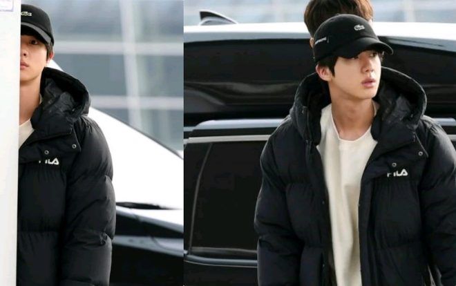 Khoảnh khắc ngộ nghĩnh: Jin (BTS) 'chơi trốn tìm' với anh quay phim trước khi lên đường đến Helsinki