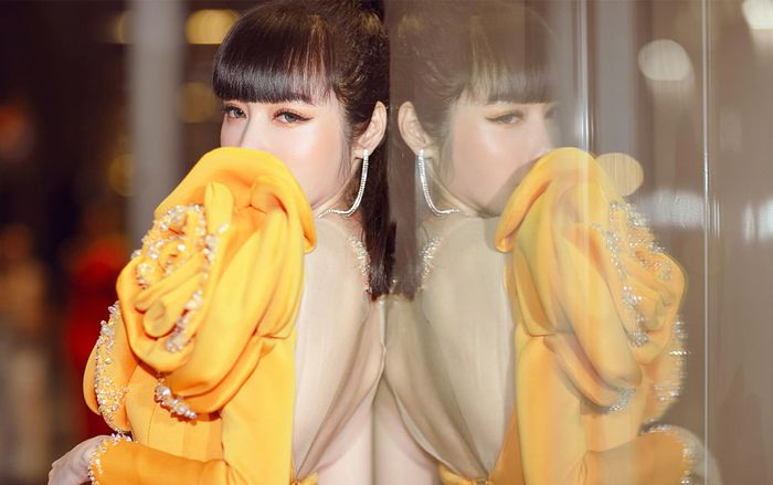 Giữa tin đồn chồng ngoại tình, Elly Trần tái xuất lung linh ví mình là 'hoa hồng vàng trong mùa bão'