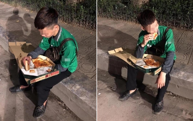 Cuối năm, hình ảnh nam shipper ngồi vỉa hè, ăn miếng pizza bị khách hàng ‘bom’ khiến CĐM ‘cay khóe mắt’