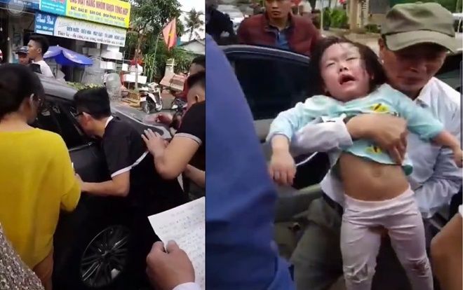 Giải cứu 2 bé gái bị mắc kẹt trên xe ô tô do bố để quên chìa khoá trong xe