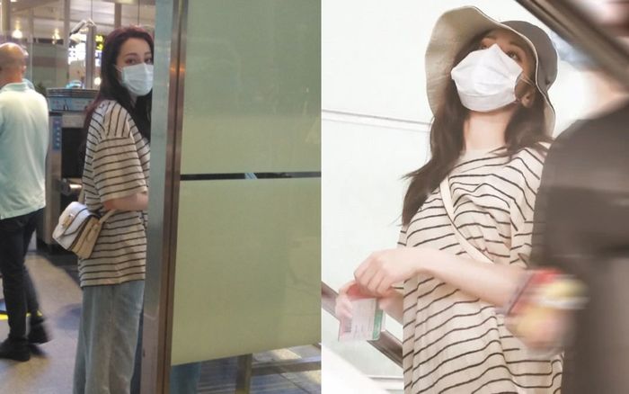 Địch Lệ Nhiệt Ba xuất hiện mệt mỏi tại sân bay sau khi bị fan cuồng tiếp cận cầu hôn