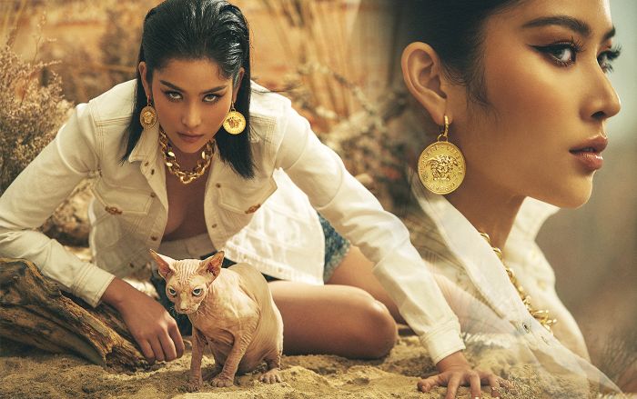 Nam Anh 'hở bạo' khoe đường cong nóng bỏng ôm mèo trên 'sa mạc' nắng gắt
