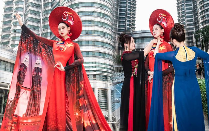 Bảo Ngọc diện áo dài rực đỏ, khoe chiều cao 'đụng nóc nhà' bên tháp đôi Malaysia