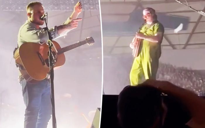 Nam ca sĩ dừng biểu diễn, chỉ tay quát vào mặt khán giả khi bị ném vật thể lạ lên sân khấu