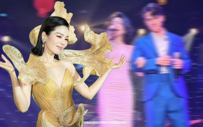 Lệ Quyên đi diễn đầu năm, tình tứ khoác tay một chàng trai trên sân khấu