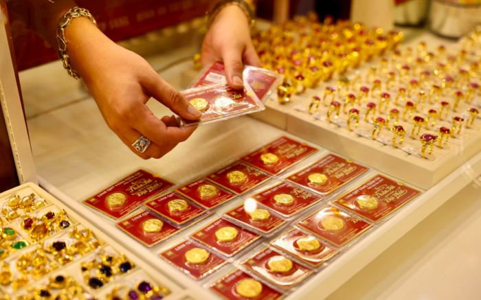 Tin tài chính hôm nay 22/12: Vàng lập đỉnh lịch sử, USD biến động