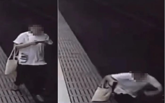 Vừa đi vừa bấm điện thoại, chàng trai bất ngờ rơi xuống đường ray