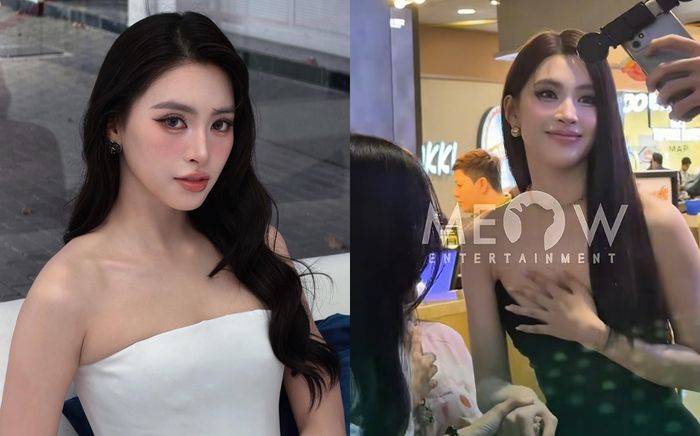 Tiểu Vy mặc áo hở bạo, phải lấy tay che chắn liên tục