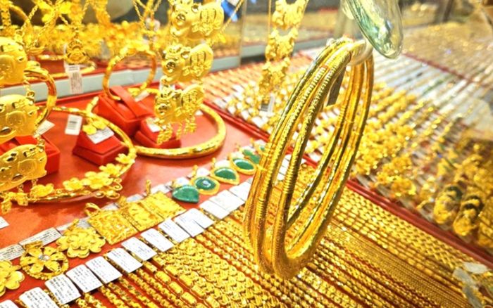 Tin tài chính hôm nay 22/3: Vàng và bạc lao dốc, USD duy trì đà tăng