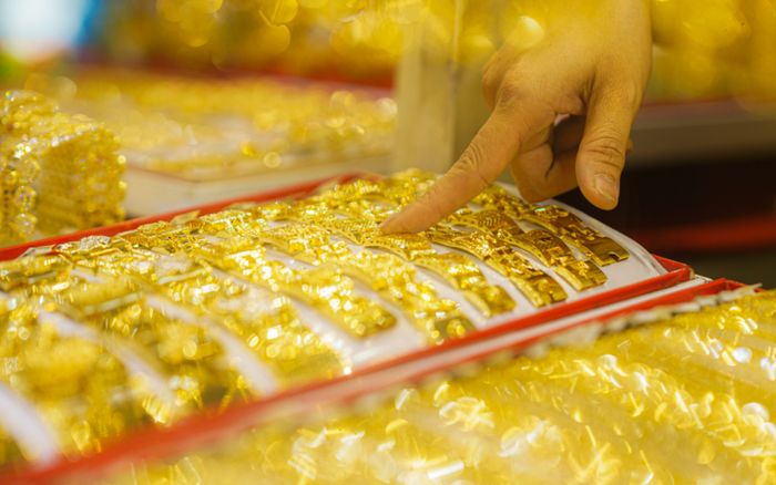 Tin tài chính hôm nay 27/3: Vàng biến động mạnh, USD neo cao