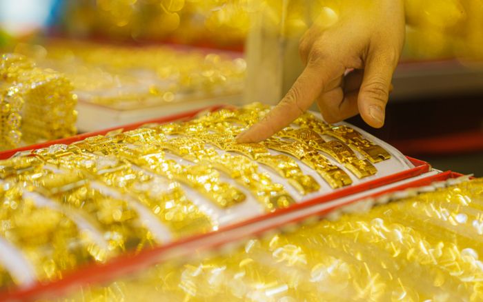 Tin tài chính hôm nay 29/3: Vàng biến động mạnh, USD duy trì đà tăng