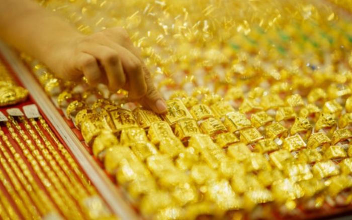 Tin tài chính hôm nay 31/3: Vàng bật tăng mạnh, USD duy trì đà cao