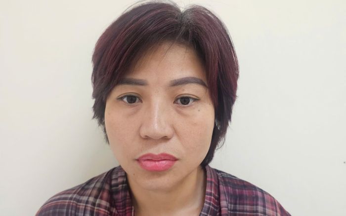 Phan Thị Thanh Nga bị bắt quả tang khi đang thực hiện hành vi xấu xí