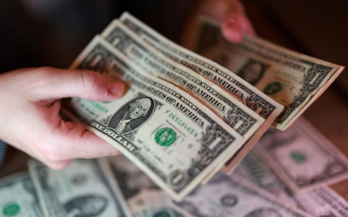 Đồng USD ổn định khi thị trường chờ quyết định Fed giữa xung đột leo thang