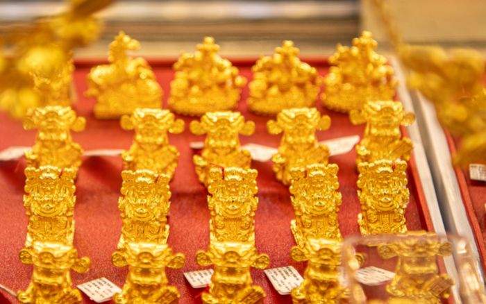 Tin tài chính hôm nay 21/5: Vàng biến động mạnh, USD hạ nhiệt