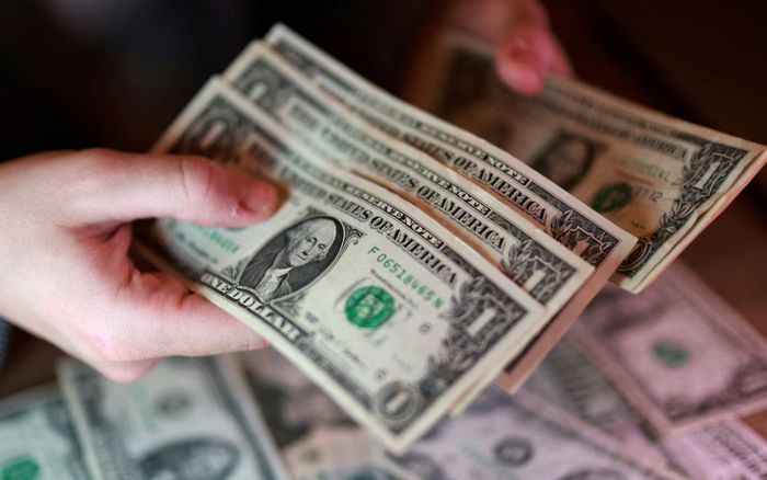 Đồng USD biến động vì lạm phát Mỹ và xung đột Trung Đông