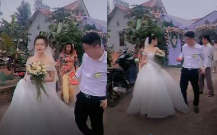 Chú rể bị dân tình chỉ trích vô tâm khi dẫm lên váy cô dâu và vô tư nghe điện thoại trong hôn lễ