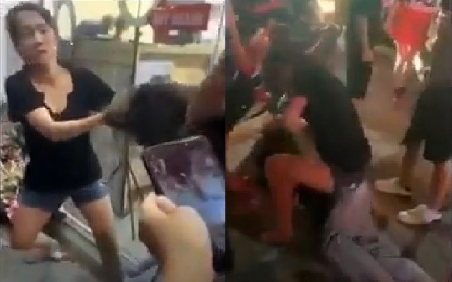 Cô gái trẻ bị nhóm người túm tóc, đè lên người đấm đá dã man