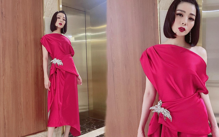 Hậu ly hôn, Lệ Quyên trông lạ với tóc ngắn diện kiểu váy màu hồng chóe nổi bật xuống phố