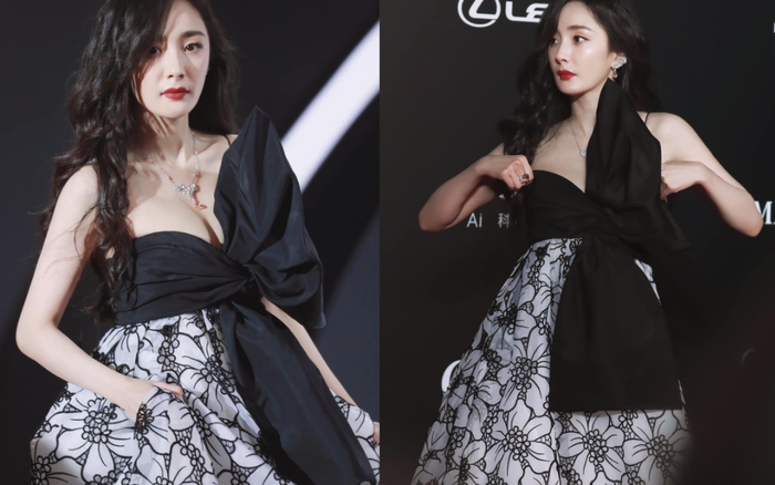 Dương Mịch diện váy nơ khủng hở vòng 1 'căng tràn' đầy sức sống liên tục lấy tay che trên thảm đỏ