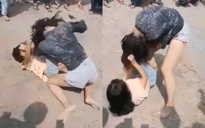 Hai nữ sinh đánh nhau túi bụi ở bãi đất trống, đám đông cổ vũ và quay clip tung lên MXH