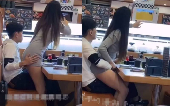 Mặc váy cũn cỡn rồi ngồi vào lòng bạn trai, cô gái khiến nhiều người trong nhà hàng đỏ mặt