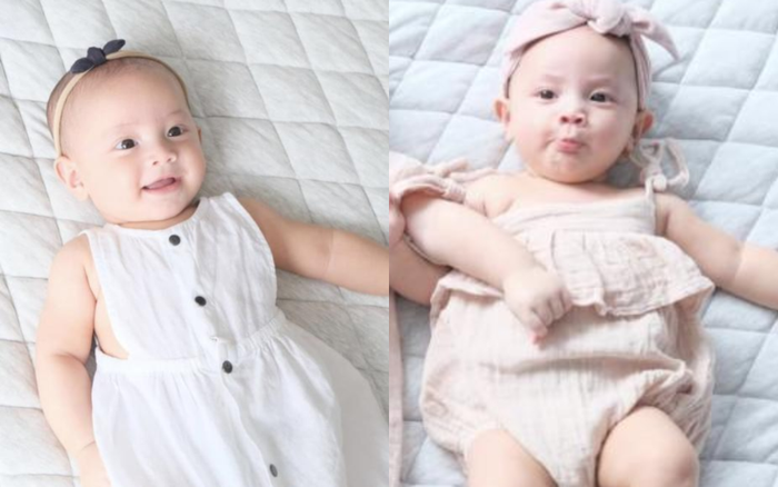 Tóc chưa mọc, Lisa đã được mẹ Hà Hồ cho đeo nơ, đội hoa, chuẩn fashionista nhí