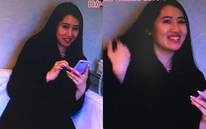 Vợ trẻ cười 'bí hiểm' trong tang lễ của chồng đại gia hơn 55 tuổi