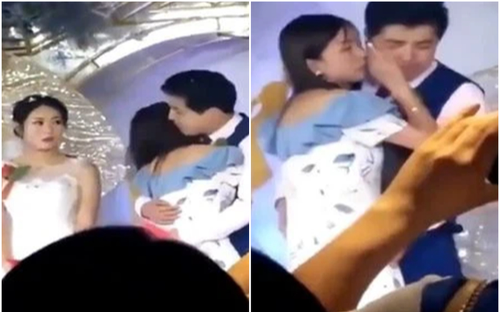 Chú rể ôm gái cô gái lạ khóc sướt mướt, mặc cô dâu 'đứng hình' ngay trong đám cưới
