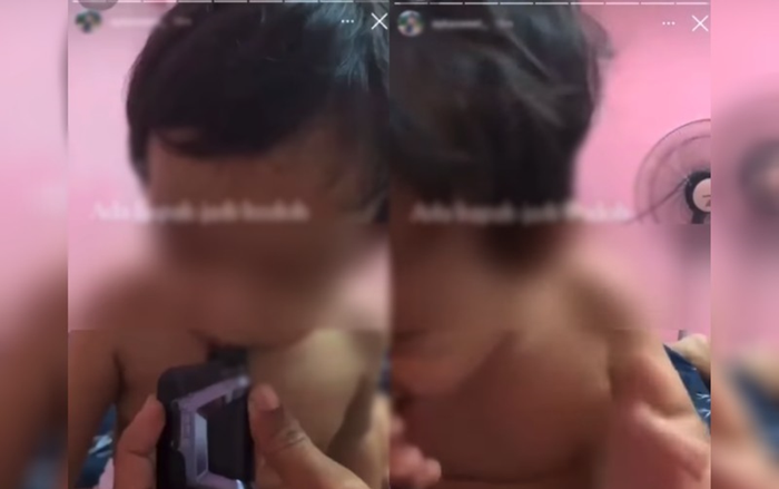 Bố ép con trai 2 tuổi hút thuốc lá điện tử, mẹ đăng lên mạng xã hội, lời giải thích càng gây phẫn nộ