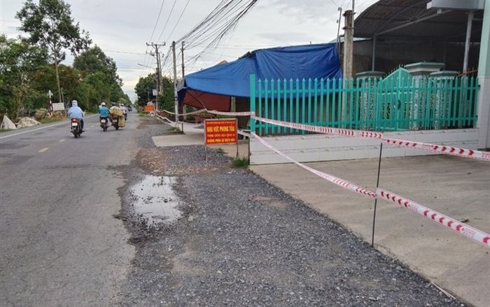 Một người bán thịt lợn trong chợ ở Tiền Giang nghi mắc COVID-19