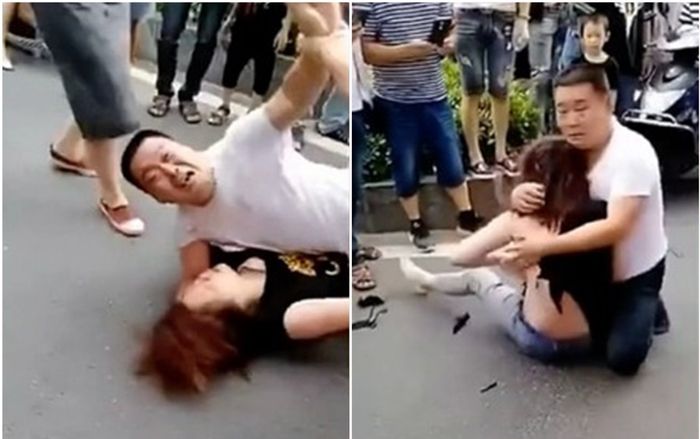 'Tiểu tam' bị vợ đánh ghen lột đồ, chồng ôm chặt người tình để bảo vệ