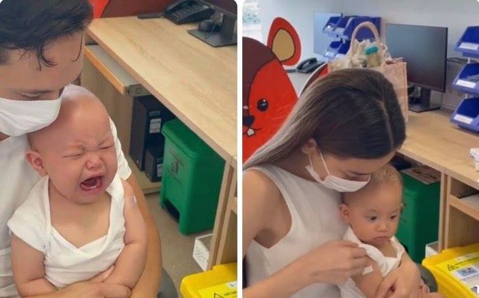 Lisa và Leon phản ứng trái ngược nhau khi được đi tiêm vaccine, nhưng biểu cảm của Kim Lý mới đáng chú ý