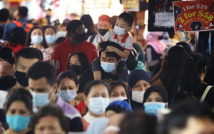 Cuộc sống 'gần như trở lại bình thường' ở Singapore với chiến lược 'sống chung với Covid'