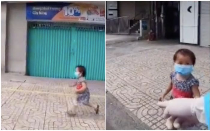 Nghẹn ngào giây phút 'thiên thần chân ngắn' gắng sức chạy lon ton theo xe nhà hảo tâm xin đồ hỗ trợ