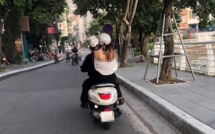 Cô gái xinh đẹp ăn mặc 'mát mẻ' dạo quanh khu vực Hồ Tây khiến dân mạng tranh cãi
