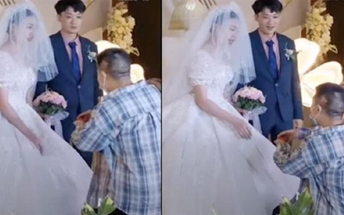 Phù rể quỳ gối trao nhẫn cưới cho cô dâu khiến hội hôn hoang mang, lý do khiến ai nấy 'cười bò'