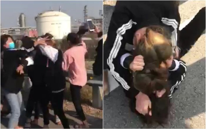 Xôn xao clip 2 thiếu nữ bị hơn 10 cô gái đánh hội đồng, thái độ của người xung quanh gây phẫn nộ hơn cả