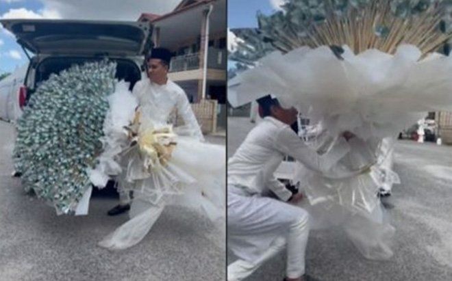 Kỳ công chuẩn bị bó hoa tiền mặt 108 triệu tặng cô dâu, chú rể suýt 'ê mặt' vì hành động này