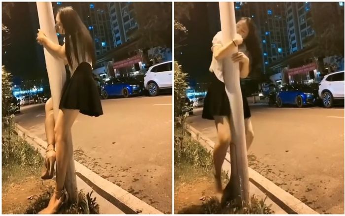 Gái xinh mặc váy ngắn, 'quện' vào cột điện ôm hôn thắm thiết trong đêm