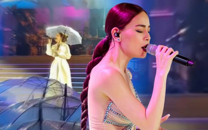 Mưa bất ngờ đổ xuống đêm nhạc tại Đà Lạt, Hồ Ngọc Hà phải vừa cầm ô vừa hát