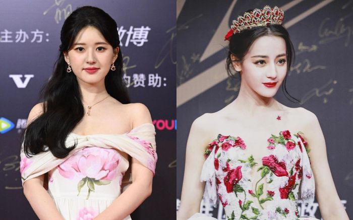 Cùng diện đầm trắng thêu hoa nhưng Triệu Lộ Tư lại bị tố cọ nhiệt và kém sang hơn hẳn Địch Lệ Nhiệt Ba